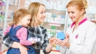 mother and daughter with a pharmacist